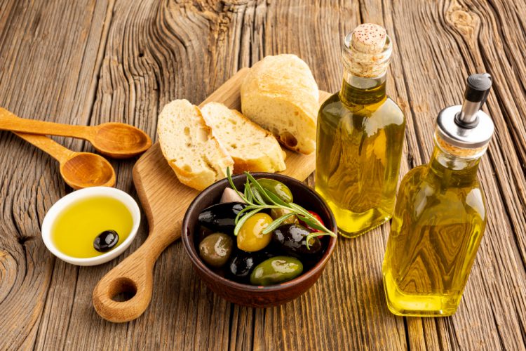 high angle olives mix bread oil bottles 750x500 1