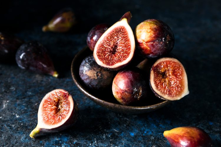 high angle bunch autumn figs plate