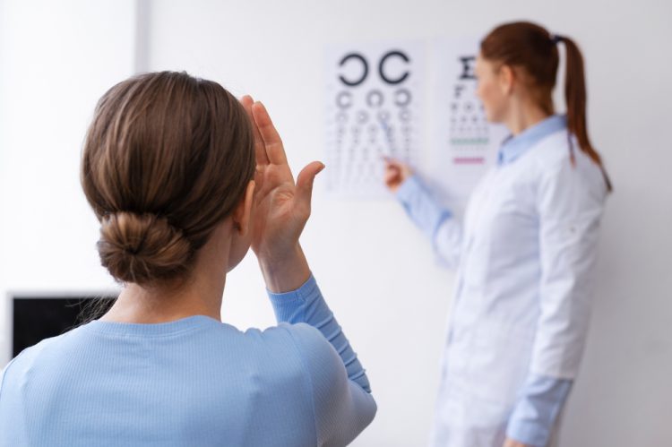 doctor testing patient eyesight